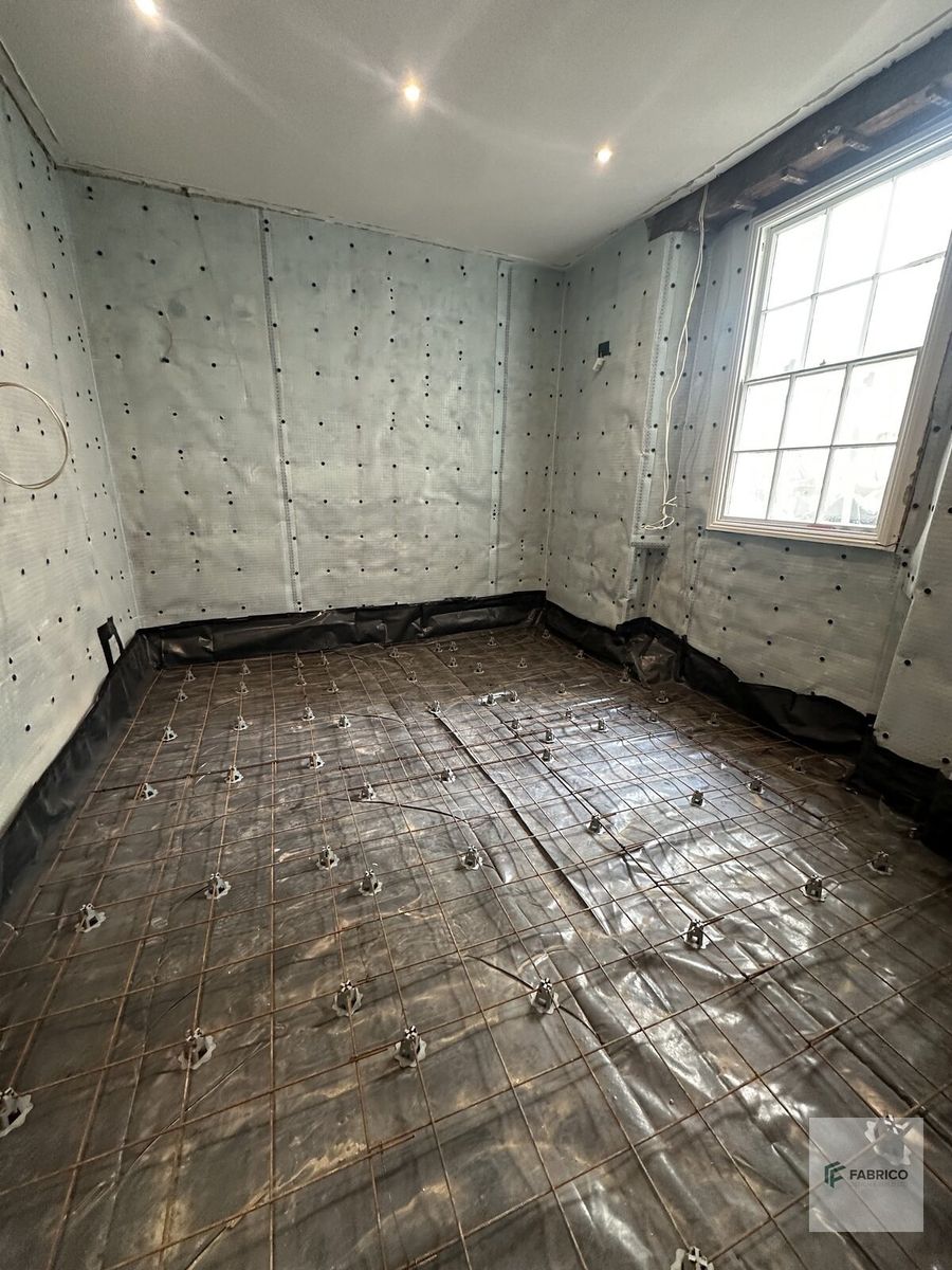 Rebar and DPM floor preparation for basement concrete pour