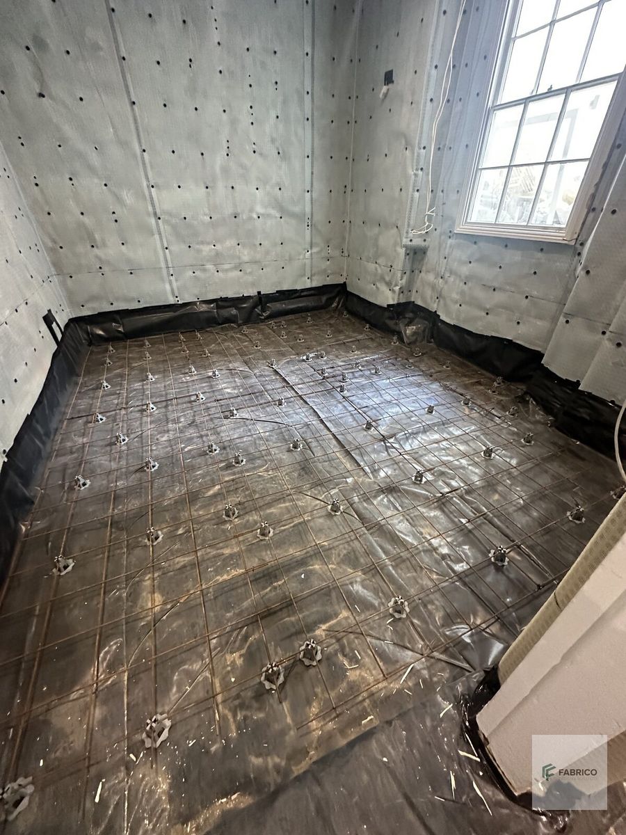 Fresh concrete slab — basement floor complete