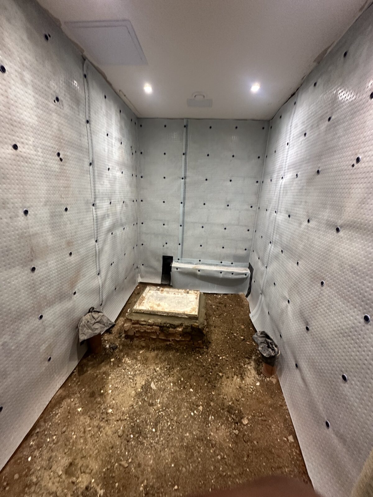 Cavity drain membrane fitted to basement walls